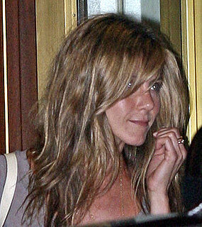 Photo of Jennifer Aniston with Messy Hair Trend. Love or Hate her Hair Style?