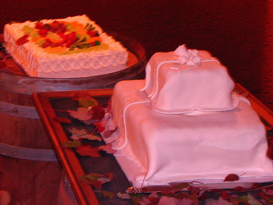 The Bride's Tres Leches cake, and Our DIY Twinkie Wedding Cake. It looks so elegant with the fondant, and everyone LOVED it!