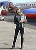 Model Bar Refaeli Wearing a Motorcycle Patchwork Leather Jacket at La Guardia Airport With Her Sports Illustrated Jet
