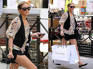 The City's Olivia Palermo Strolls NYC in Diane von Furstenberg Floral Blouse, Black Shorts, and Tom Ford Anouk Sunglasses