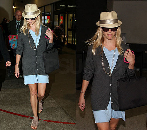 Reese Witherspoon in a Fedora and Blue Dress At LAX Flying Back From Italy