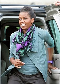 Michelle Obama Wearing a Mouthwash Green Rick Owens Jacket and Purple Watch in Paris