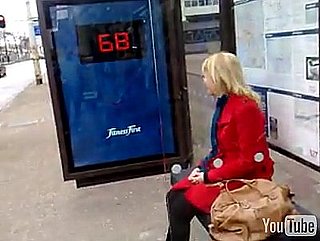 Fitness First Advertisement at Bus Stop Includes a Scale