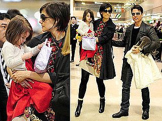 Photos of Tom Cruise, Katie Holmes, and Suri Cruise at Narita Airport in Japan