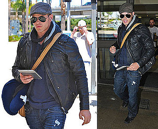 Photos of Kellan Lutz Arriving at LAX With His Kindle