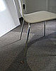 Use Pieces of Old Mouse Pads to Fix Wobbly Chair and Table Legs