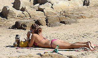 Ashley Tisdale and Other Celebrities Bring BlackBerry and iPhone Cell Phones to the Beach and Pools in Bikinis