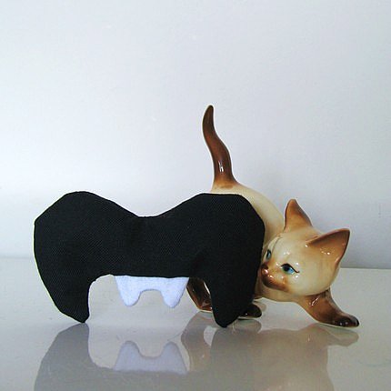Vampire Fangs Moustache Catnip Pillow ($10)