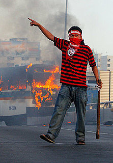 Front Page: Bangkok on Brink as Protests Rage