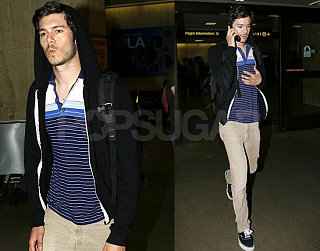 Adam Goes to LAX, Prob Not Whistling OC Theme Song