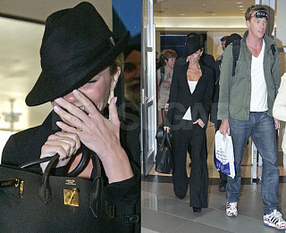 Posh Cracks a Smile at LAX