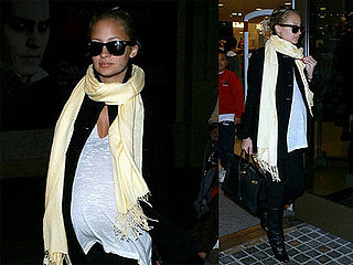 Nicole Wears Her Sunglasses To Shop at Night