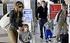 Sarah Jessica Parker and Matthew Broderick with James Wilkie at LAX