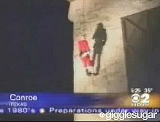 Santa Gets Stuck Climbing Wall