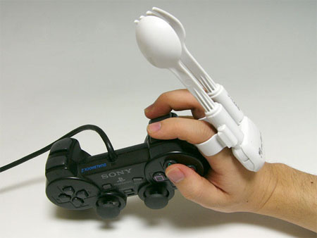 hardcore-gamers-finger-food-strap-on-gadget-detail-1 hardcore-gamers-finger-food-strap-on-gadget-detail-1
