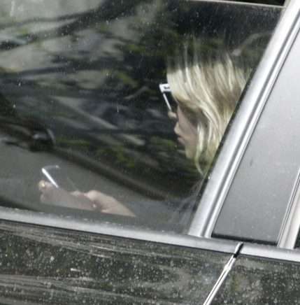 Guess Who Is Checking Her Text Messages? 